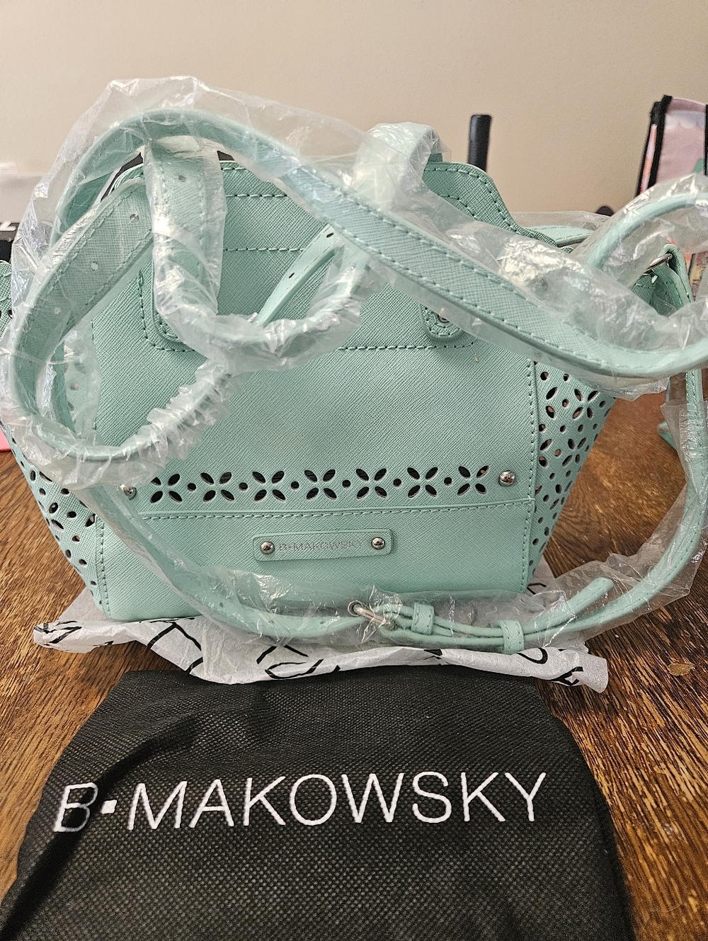 b. makowsky Mint Green Perforated Leather Crossbody